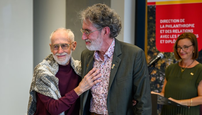 Julien Poitras en compagnie de son père